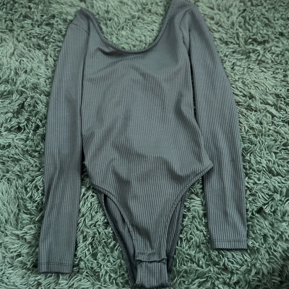 Green bodysuit with open back